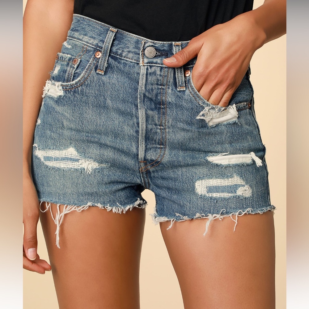 501 High Rise Medium Wash Distressed Denim Cutoff Shorts